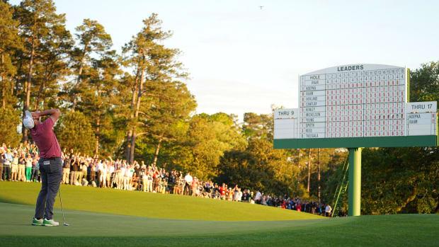 Jon Rahm is pictured on the 18th green after winning the 2023 Masters.